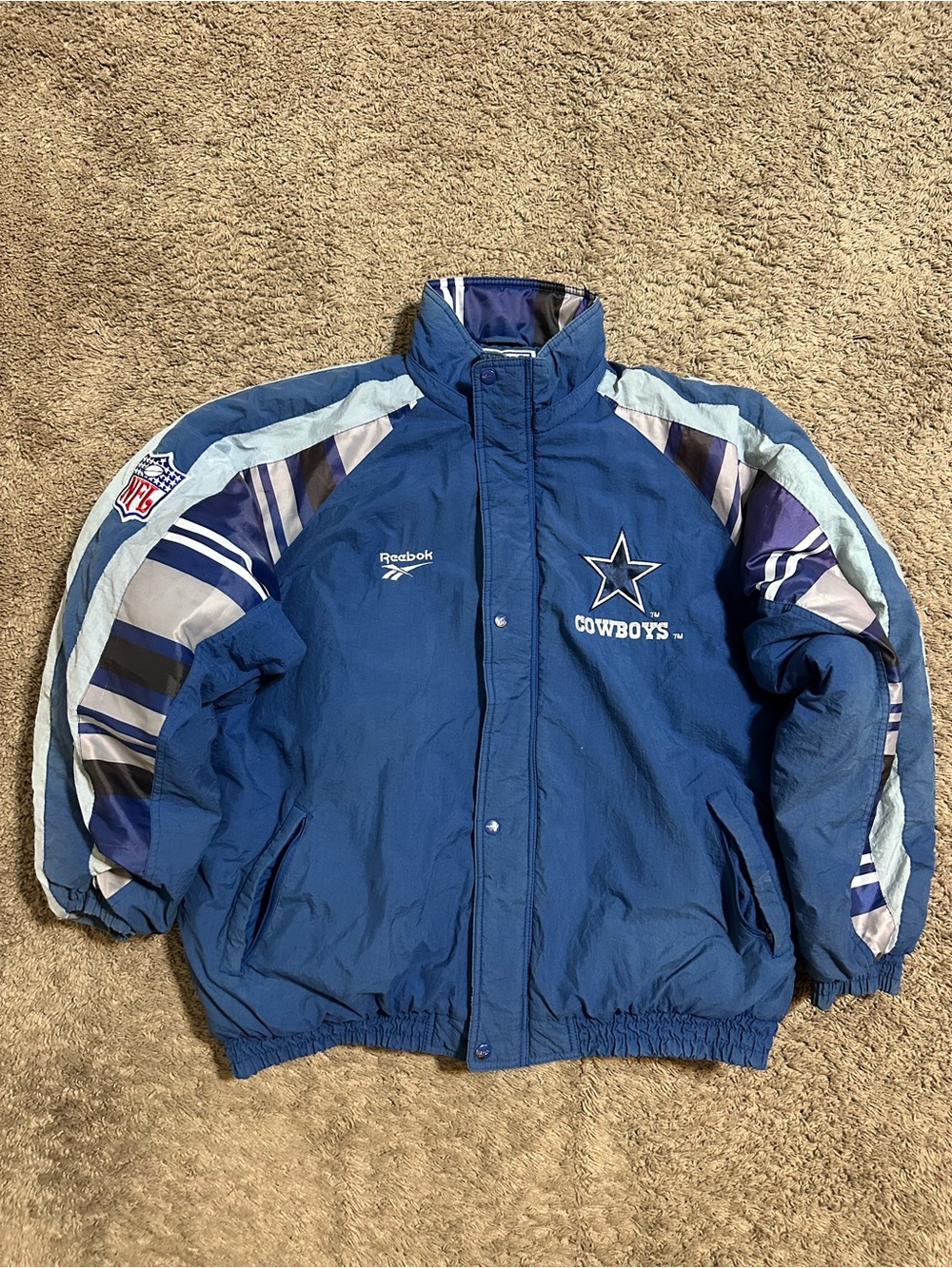 Vintage Reebok Dallas Cowboys “triple pattern” jacket 90s size Xl